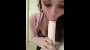 A Teen Sucks a Dildo